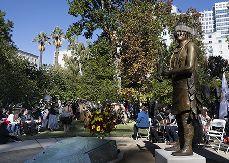 statue with dancers_Native American Monument Dedication 557 11-07-23.jpg
