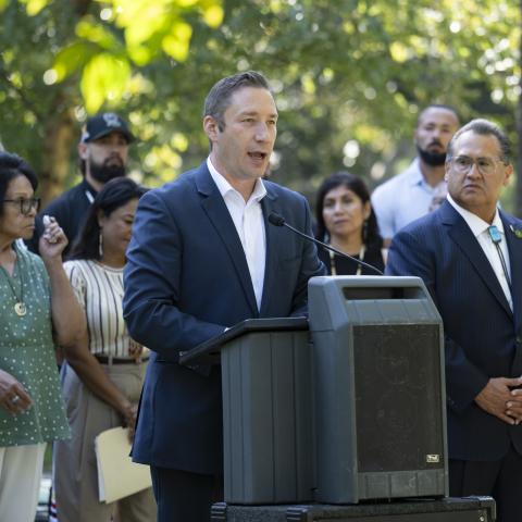 member speaking at press conference 