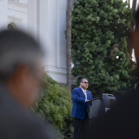 Speaking at podium