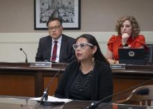 (Background) Assemblymembers Mike Fong and Pilar Schiavo; (Foreground) Morning Star Gali, the Founder and Executive Director of Indigenous Justice