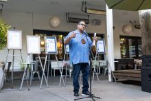 speaking at microphone