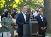 member speaking at press conference 