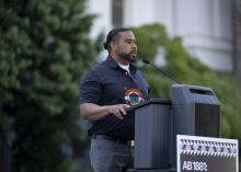 Speaking at podium