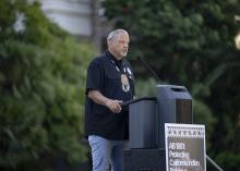 Speaking at podium