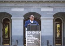 Speaking at podium