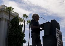 Speaking at podium