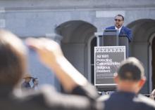 Speaking at podium